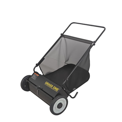 Grass One 26-inch sweeper captures debris along a wide path