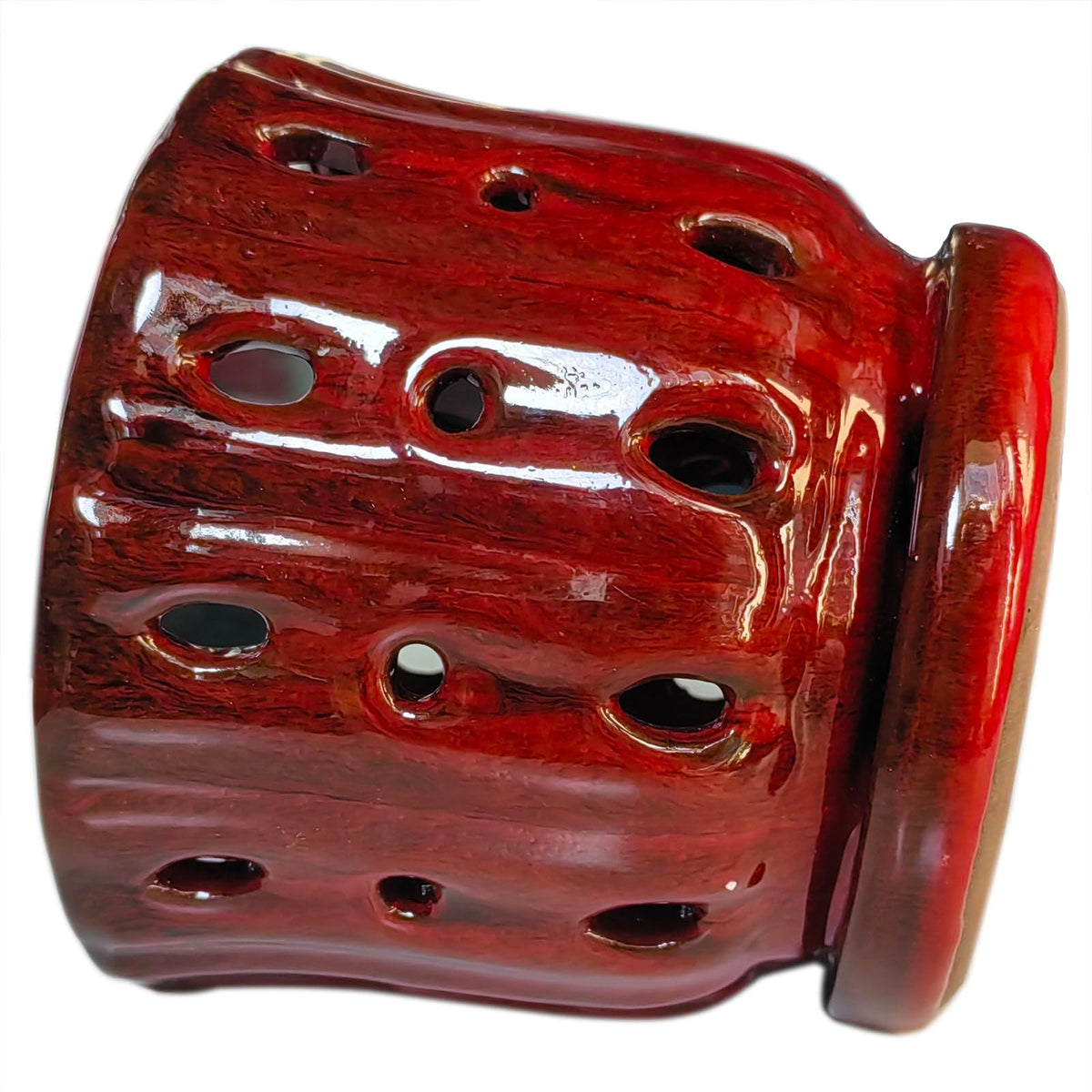 Grdthzey ceramic pot in classic red complements any plant.