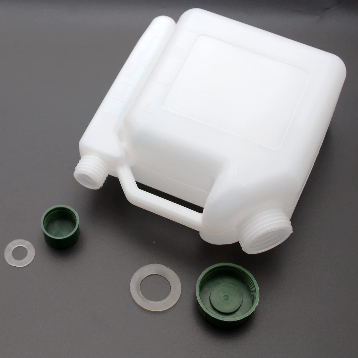 Grebizan 1L bottle durable plastic construction resists spills during refueling tasks.