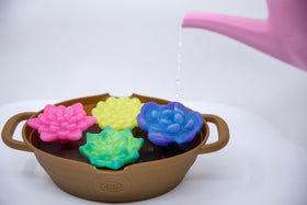 Green Toys Rainbow Bloom set lightweight watering can ideal for small hands.