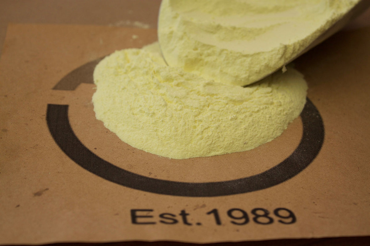 Greenway Biotech Organic Sulfur Powder scoop showing easy application for sulfur deficiency relief.