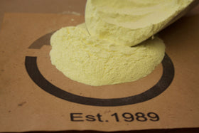Greenway Biotech Organic Sulfur Powder scoop showing easy application for sulfur deficiency relief.