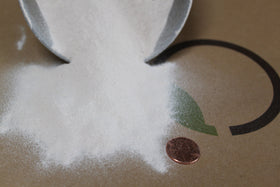 Greenway Biotech Dolomite Lime Plus packaging close-up highlights calcium and magnesium for soil health.