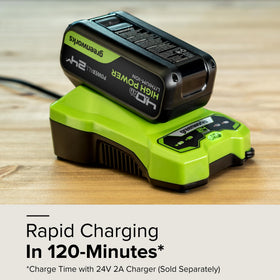 Greenworks 24V battery powering multiple compatible tools in a shed