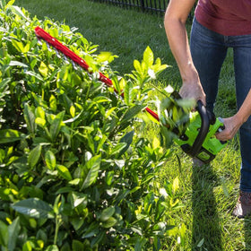 Greenworks hedge trimmer cushioned grip for comfortable trimming.