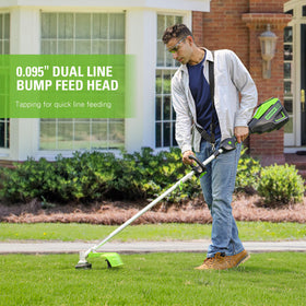 Greenworks Pro 80V trimmer battery charging station demonstrates quick recharge for extended work sessions.
