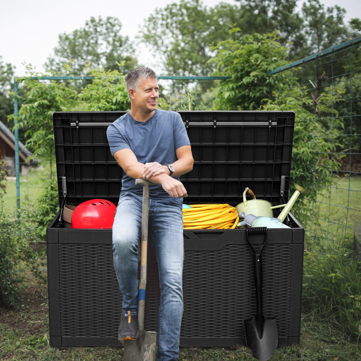 Greesum resin deck box on patio, weatherproof outdoor storage solution