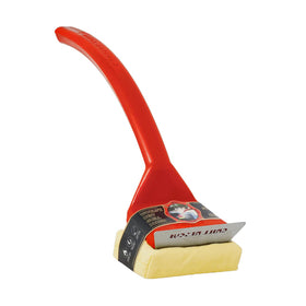 Grill Rescue bristle-free brush on a hot griddle for safer cleaning