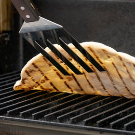 GrillGrate food-lift-safely helps prevent sticking during cooking