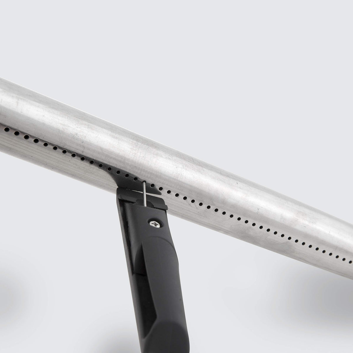 GrillPro maintenance brush shows stainless steel bristles for thorough cleaning of grills.