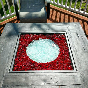GRISUN Red Fire Glass outdoor firepit adds warm ambience.