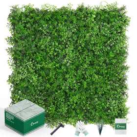 Grooy boxwood hedge wall panels create a lush privacy backdrop.