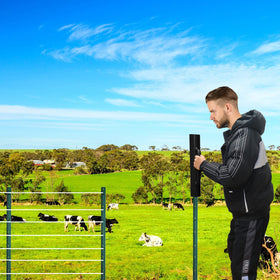 Gtongoko 18LB T Post Driver in use for easy fence post installation.