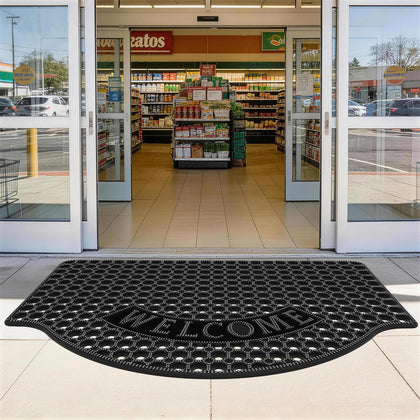 GTRY 31x47 black rubber mat with drainage holes drains water quickly at entrances