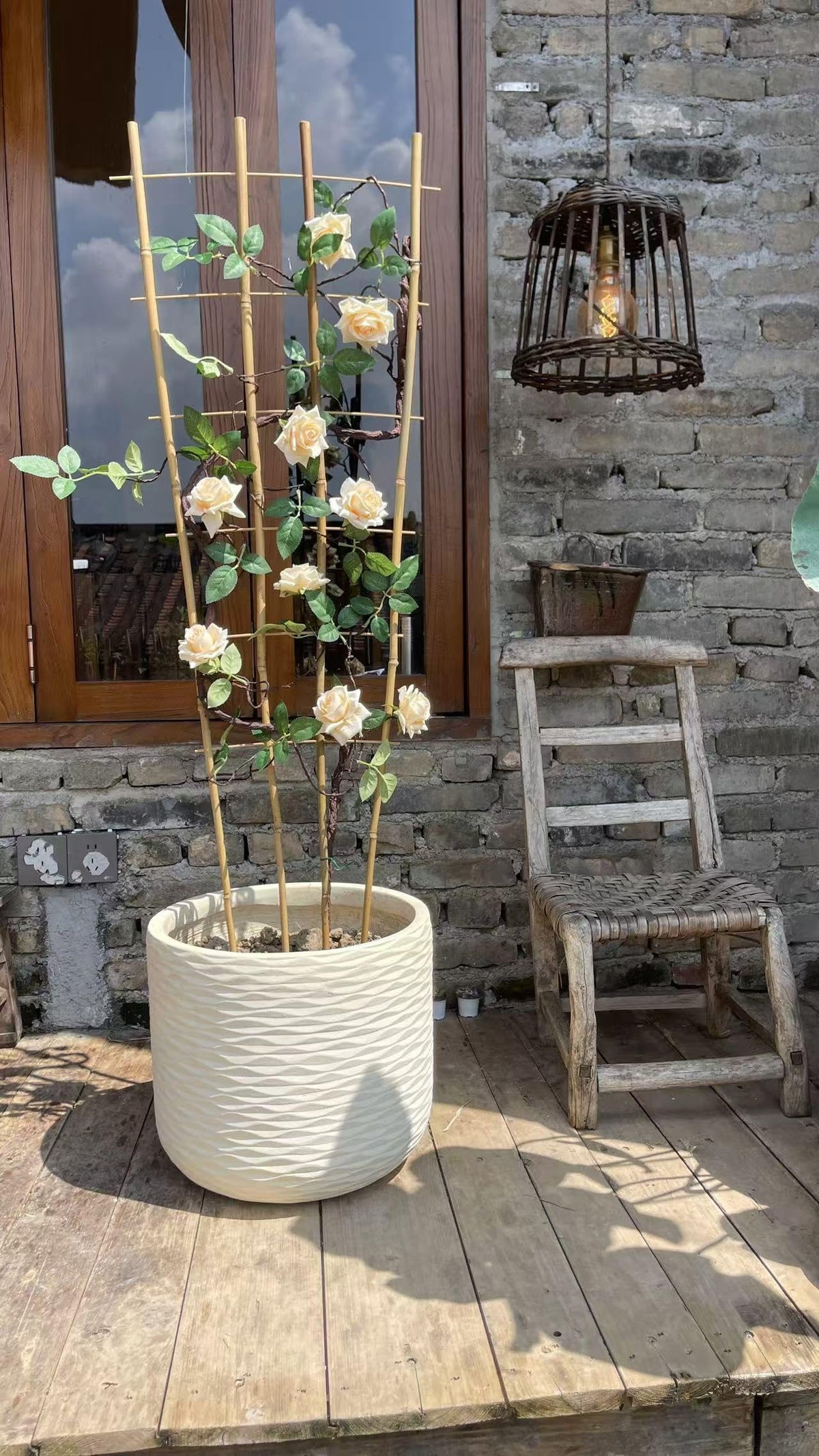 Guangye bamboo trellis installation example shown with planters