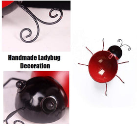 Gudui metal ladybugs easily latch to fencing with bottom hooks.