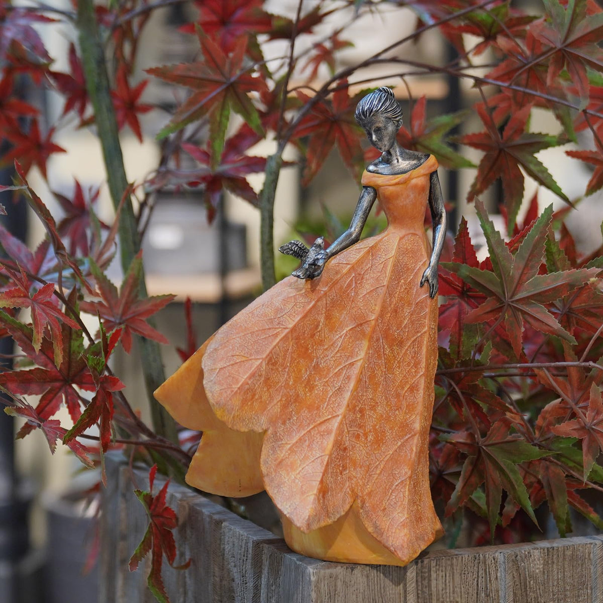 Guichifun angel girl resin statue holding a bird for garden use