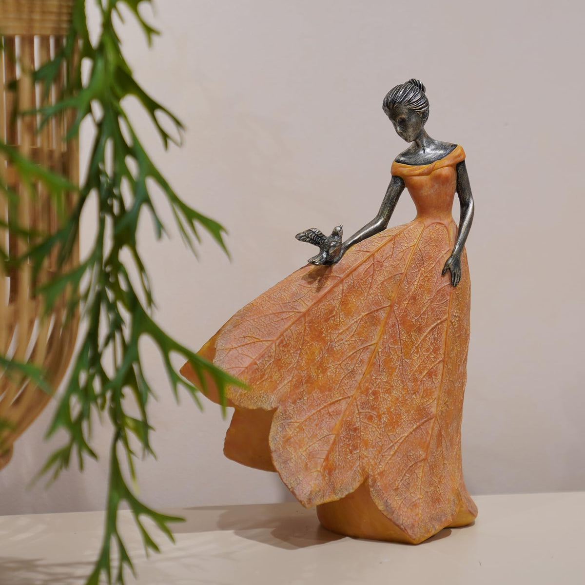 Guichifun angel girl resin statue holding a lily for indoor display