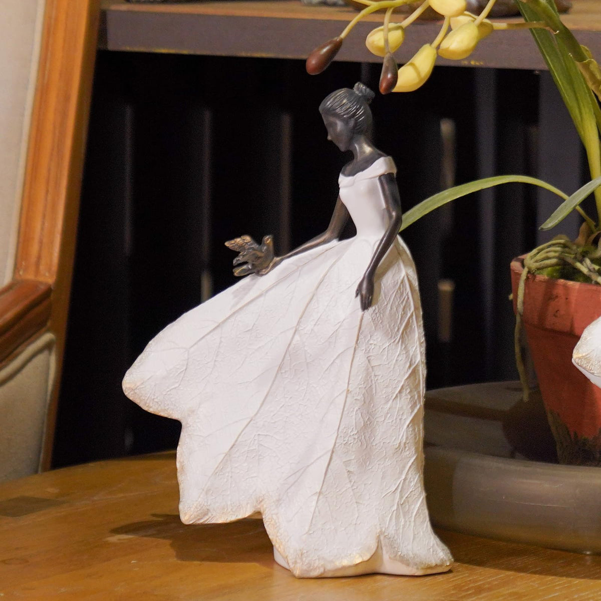 Guichifun leaf-skirt angel-girl statue enhances garden charm and room ambience.