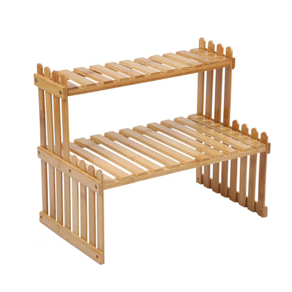 GURECOD bamboo plant stand with stair-step design for space-saving desk organization.