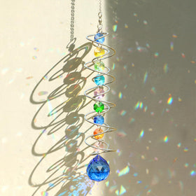 GWAHSA sun catchers gazing ball with spiral tail creates colorful rainbows in windows.