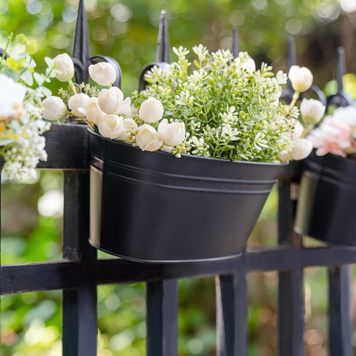 Thoughtful gift-ready garden decor using GYATSOCYG black planters.