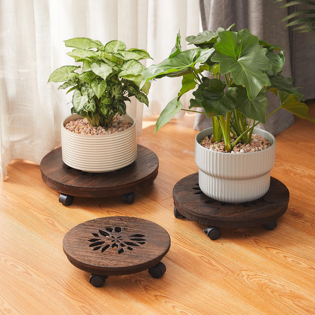 GZQWDC plant stand with lockable wheels keeps plants secure in place.