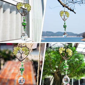 Tree of Life crystal suncatcher by H&D creates delicate prismatic beams