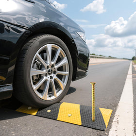 Hacaroa wheel-stop stake installed as a resilient parking boundary.
