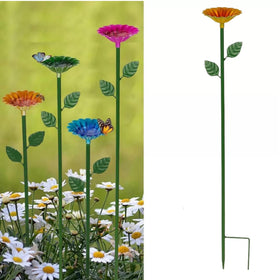 Haetair Bee Watering Station with flower design attracts pollinators in the garden.