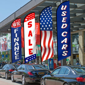 Hahafelt outdoor advertising flags setup for car dealership entrances
