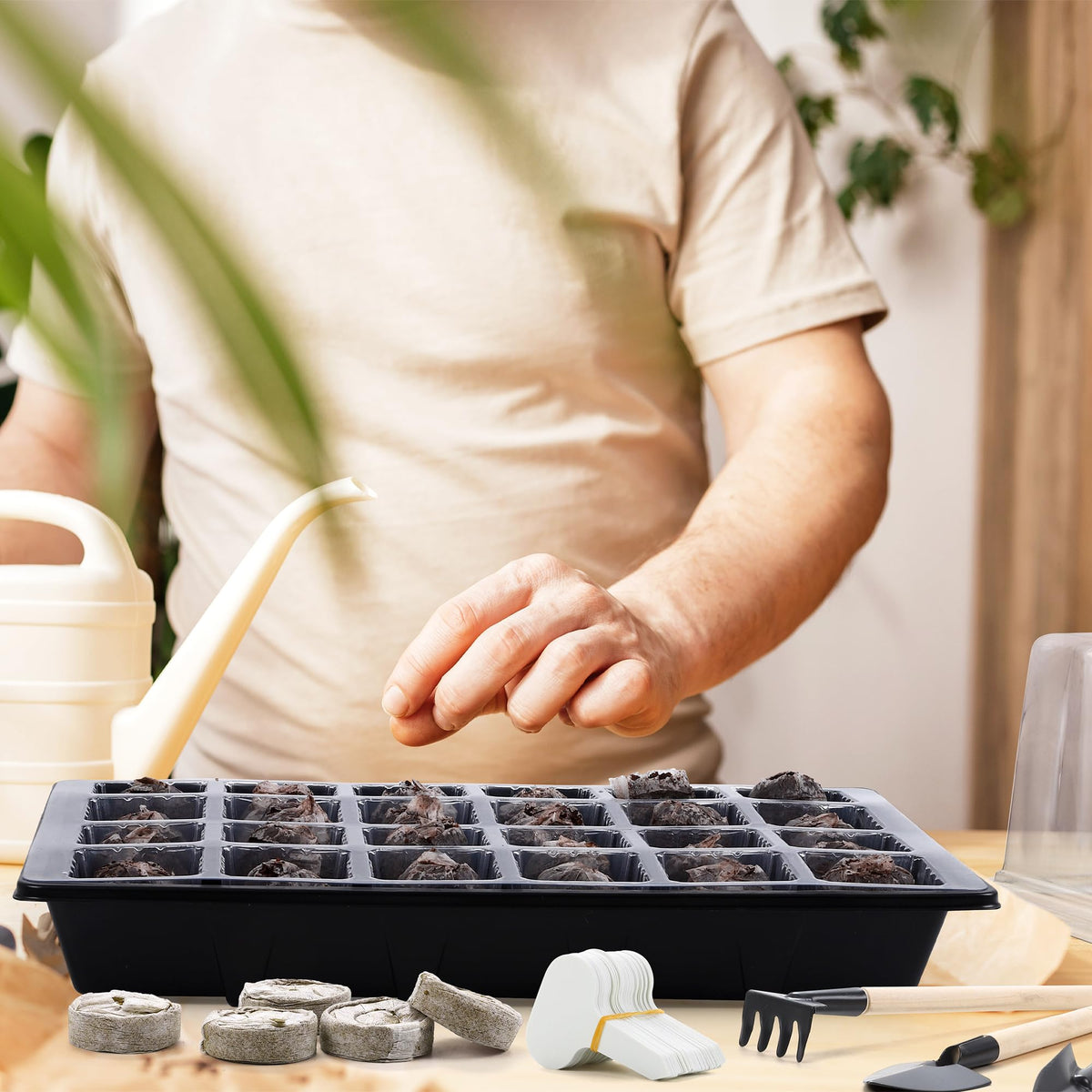 Hahood gardening tools included for transplant prep.
