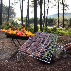 Close-up of Hakan grill basket wooden handle for safe grip