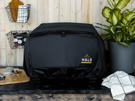 HALO Versa 16 pizza oven cover side pocket for 1 lb LP gas container.