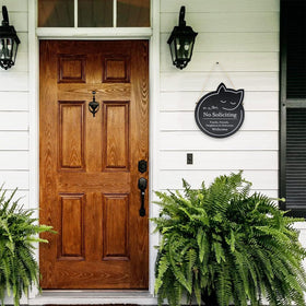 Handook no soliciting sign porch-hanging for curbside charm.