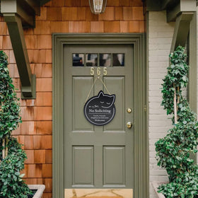 Handook no soliciting sign window display for inviting spaces.