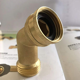 Hanobo elbow connector in outdoor setup with sprinkler timer
