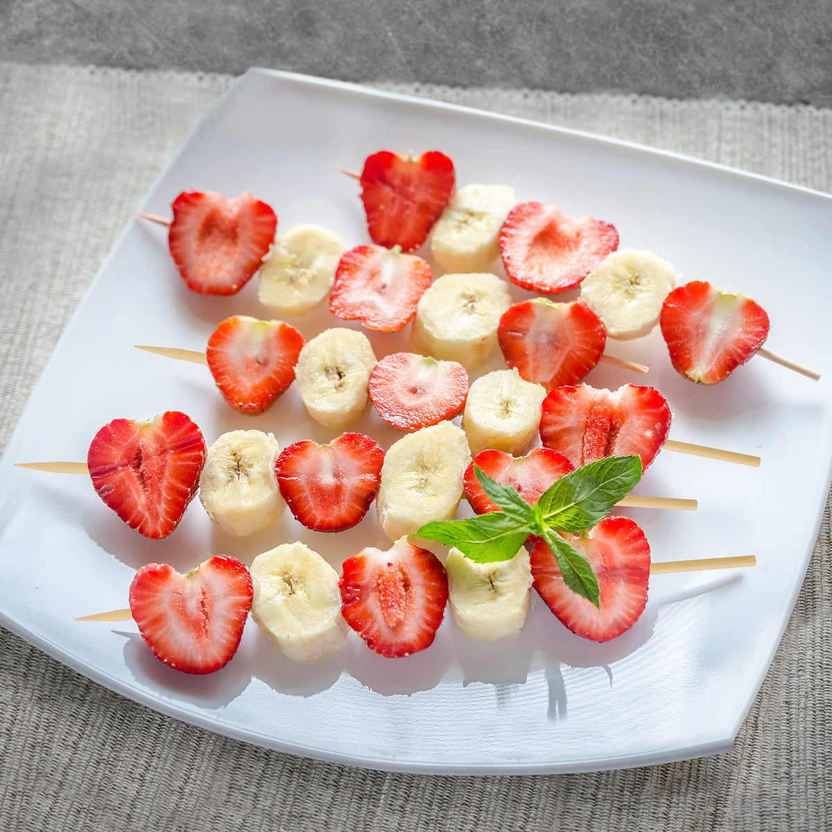 HANSGO catering setup shows party-ready skewers for appetizers and bites.