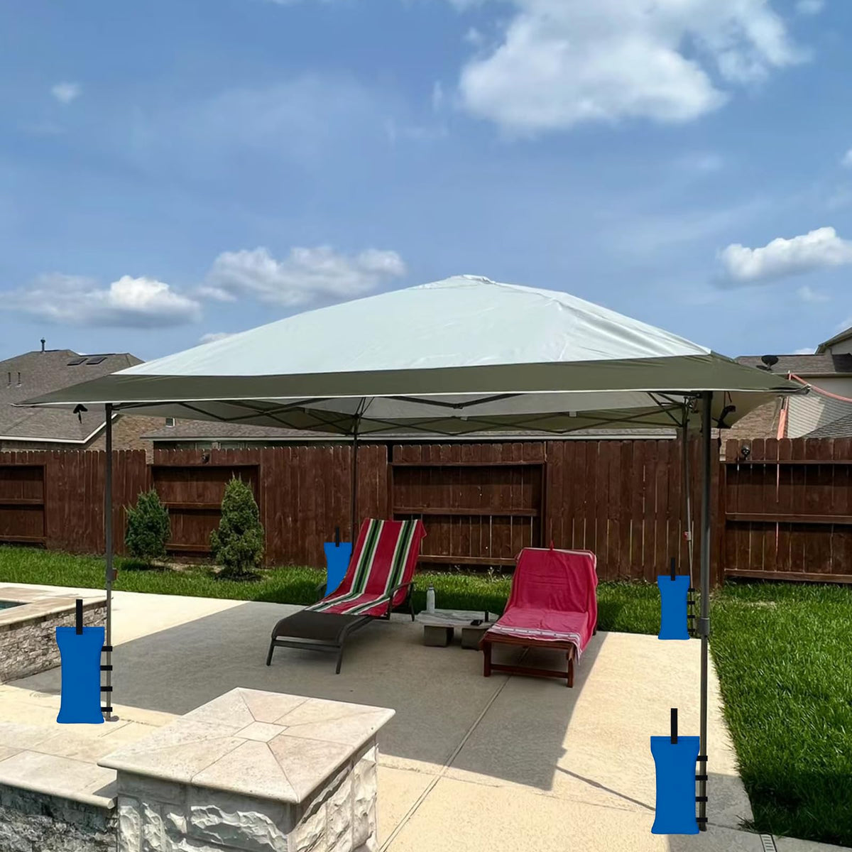 Blue HAZBEN canopy weights used on a patio for stable shade