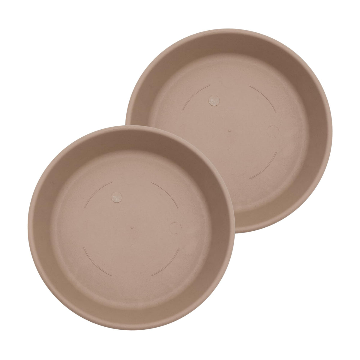 The HC Companies 14in round sandstone saucer catching excess water under a plant pot.