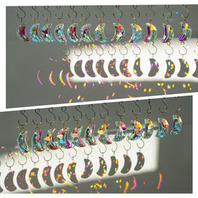 H&D HYALINE & DORA rainbow maker casts color-filled light across walls.