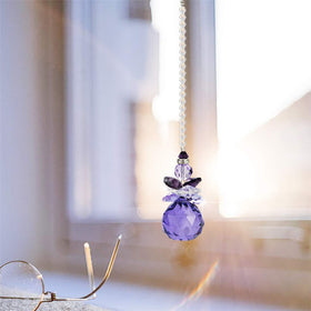 H&D crystal angel sun catcher for car windows creates rainbow sparkles on the go.