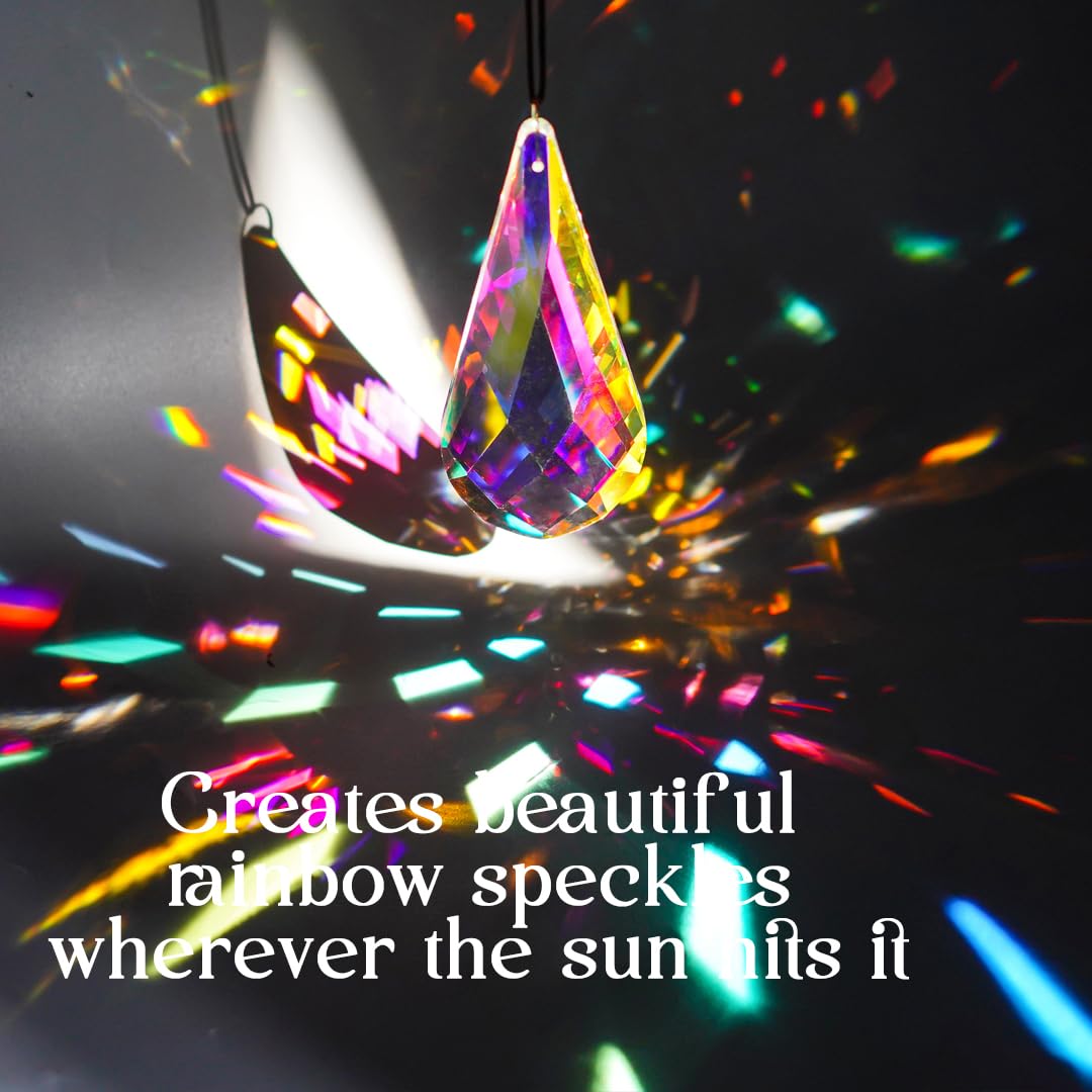 H&D crystal suncatcher AB prism in sunlight creates colorful rainbow display.