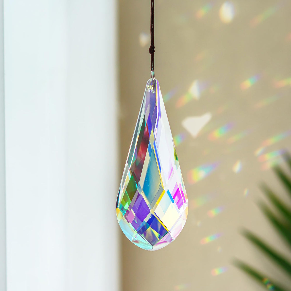 H&D suncatcher AB prism brightens doorway with shimmering colors.