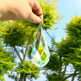 H&D crystal prism suncatcher enhances chandeliers with rainbow sparkle.