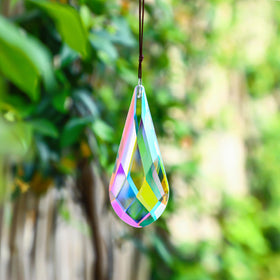 H&D AB prism suncatcher adorns car rearview mirror with colorful light show.