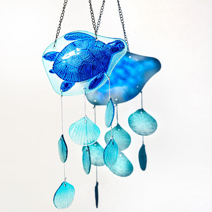 H&D Hyaline & Dora 20-inch glass sea turtle wind chimes add coastal charm to outdoor spaces.