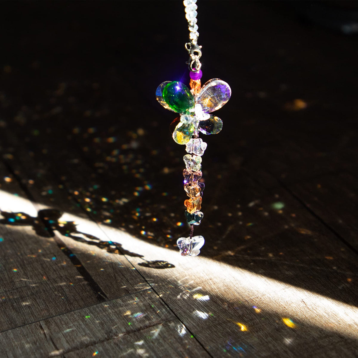 HD Hyaline & Dora bird deterrent crystal pendants may deter birds from patios.