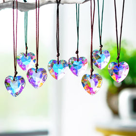 H&D Hyaline & Dora car-mirror prisms create tiny rainbows on surfaces.