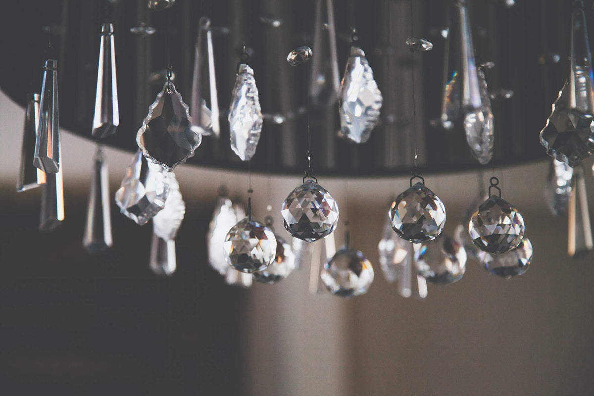 H&D Hyaline & Dora grid-shaped crystal pendant brightens curtains and shelves.